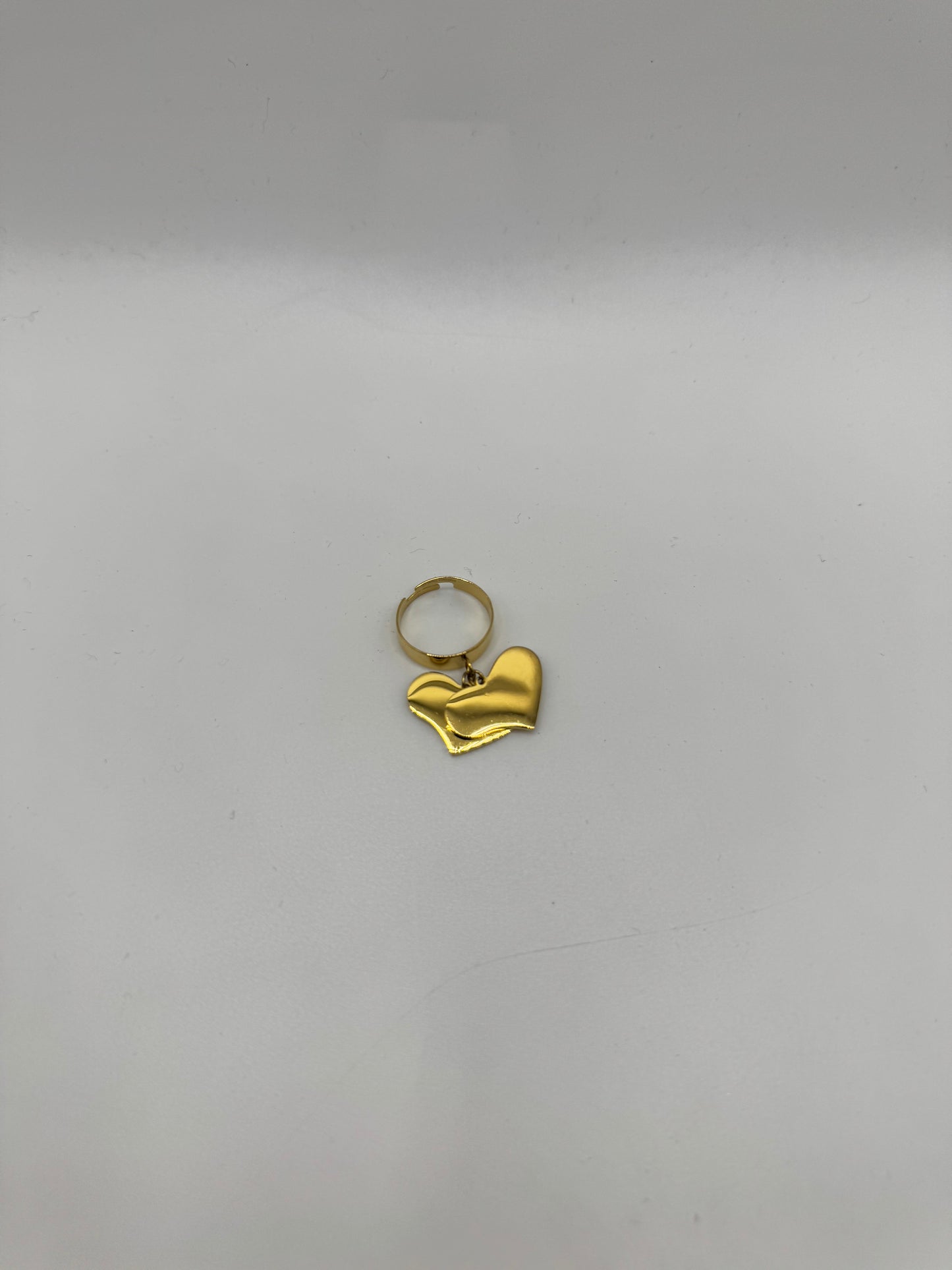 Anello cuori pendenti