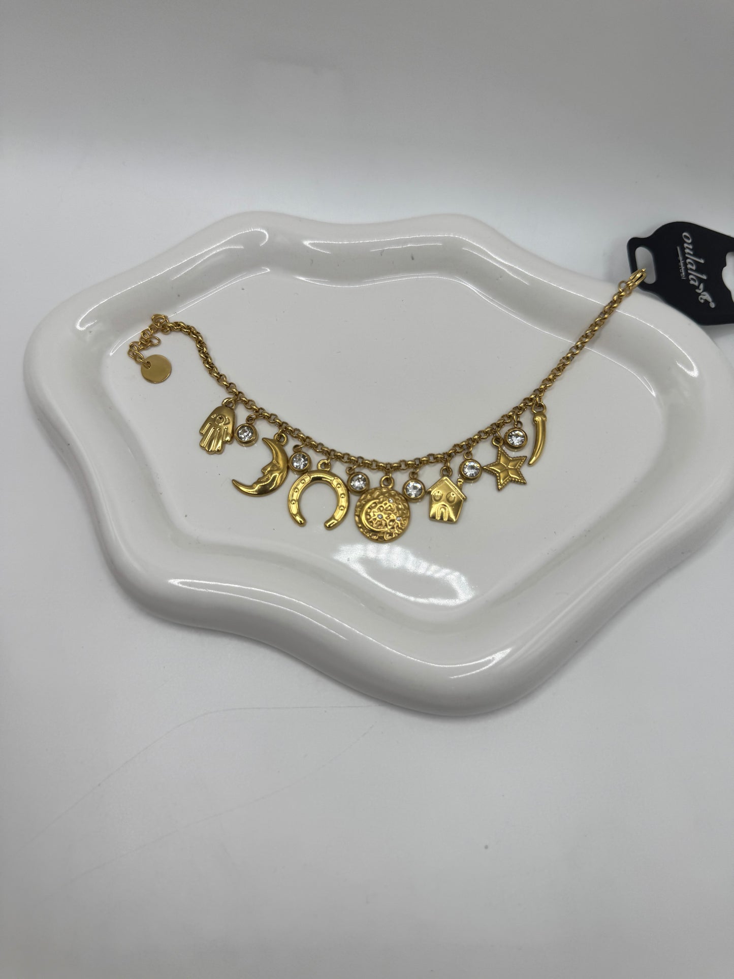 Bracciale charms e punti luce