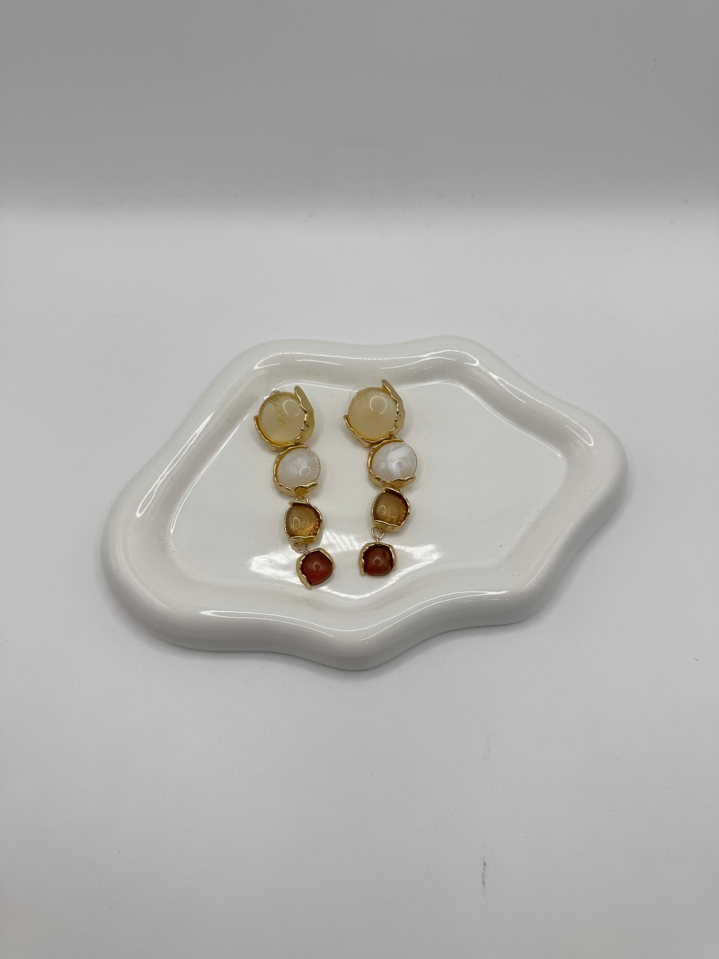 Pendenti sfumature beige