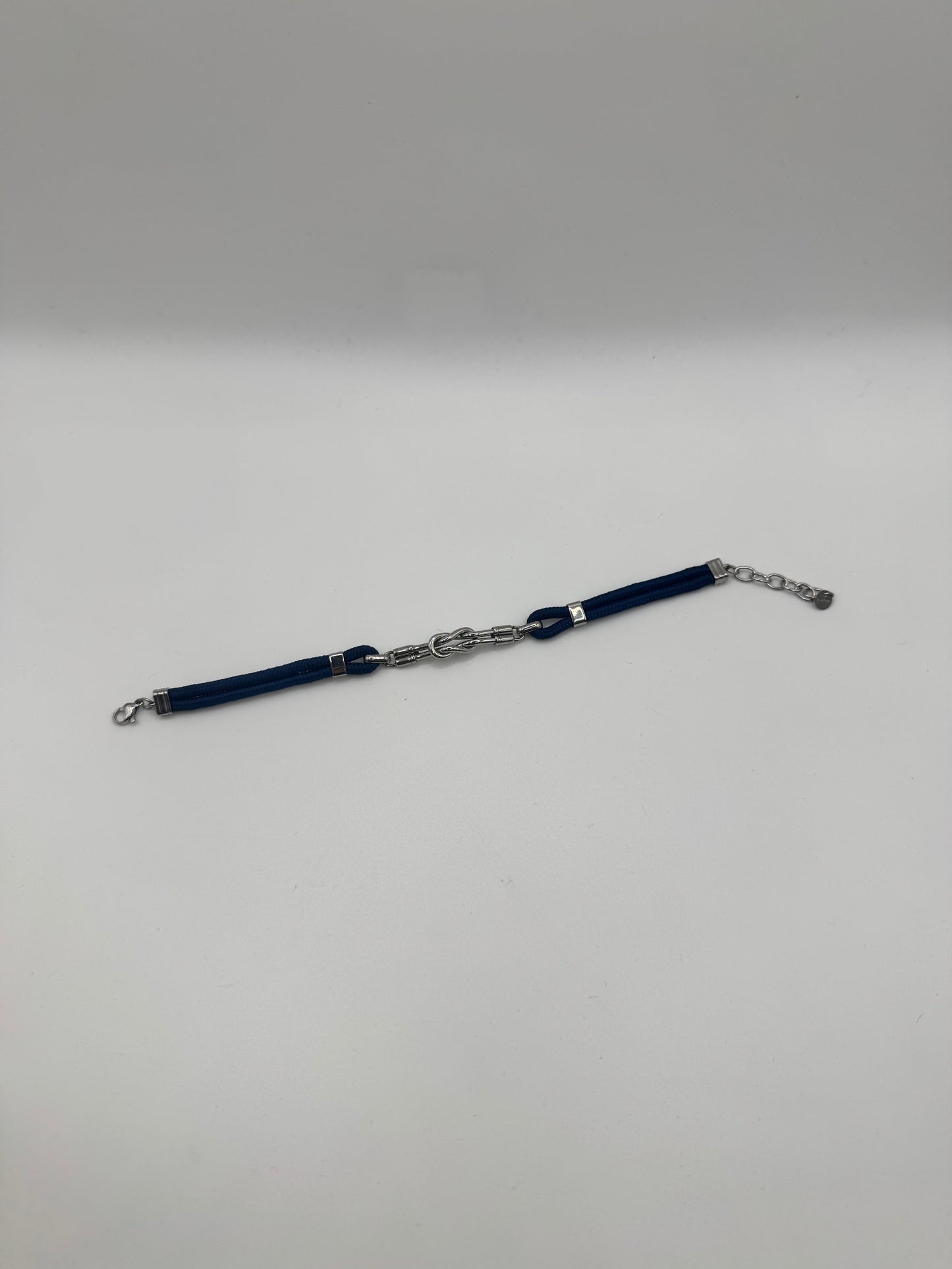Bracciale in tessuto con nodo in acciaio
