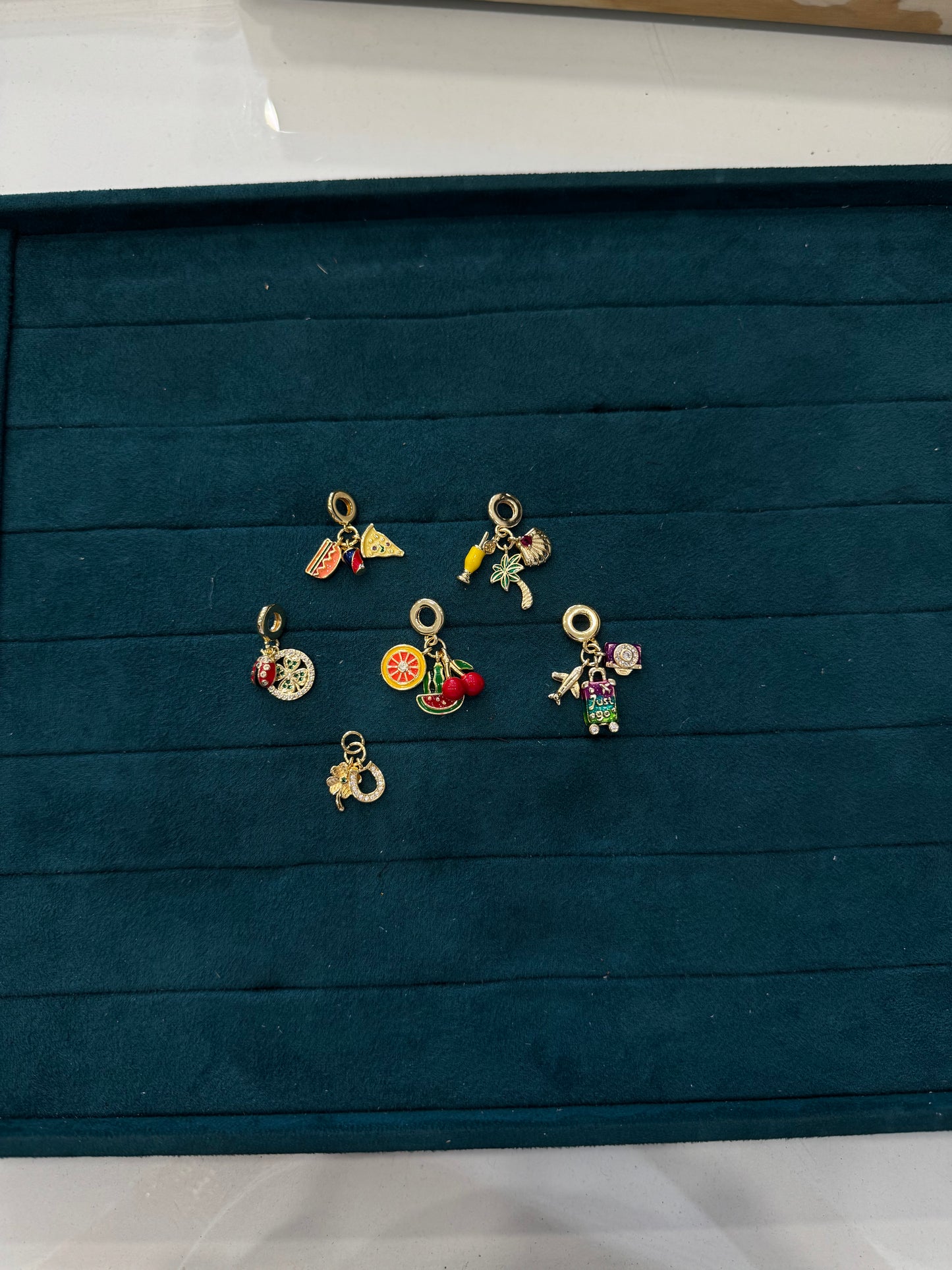 Charm multiciondolo