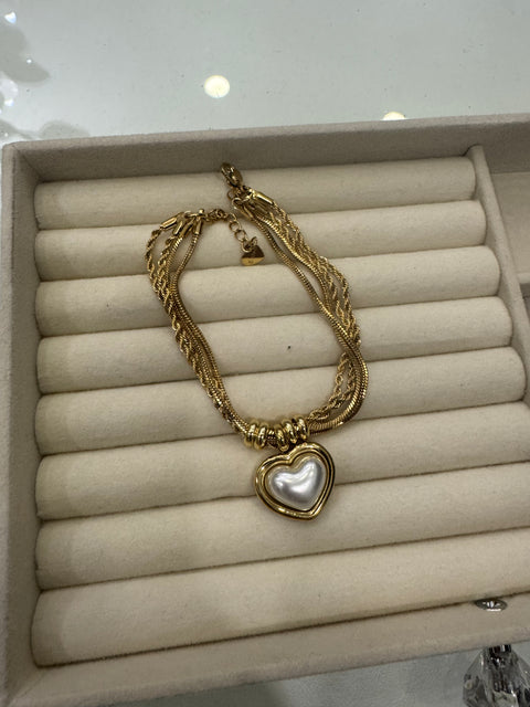 Bracciale multifilo con cuore di perla