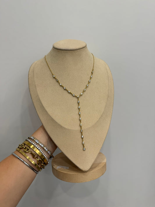 Collana y chicchi di luce