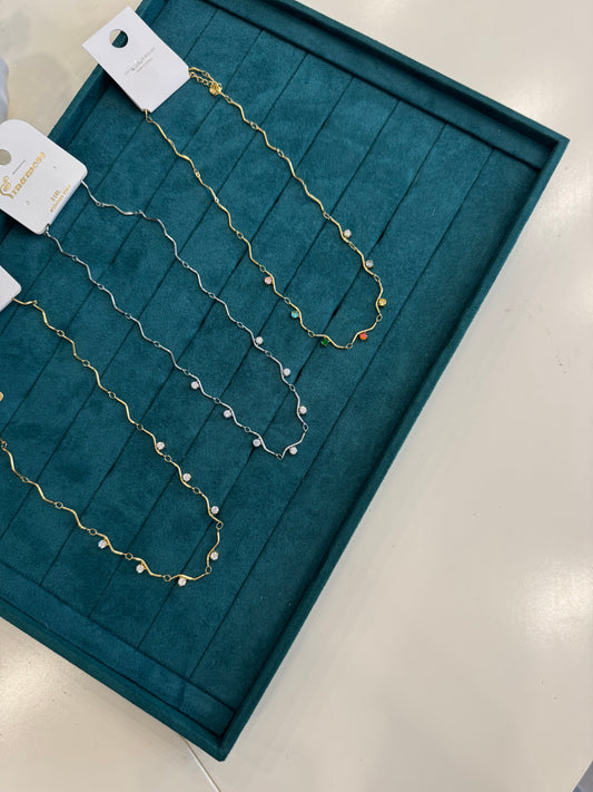 Collana onda punti luce