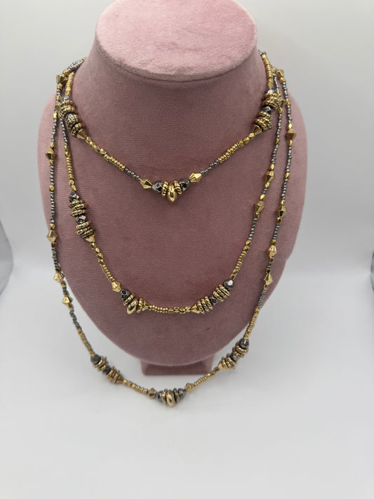 Set di tre collane bronzo e oro